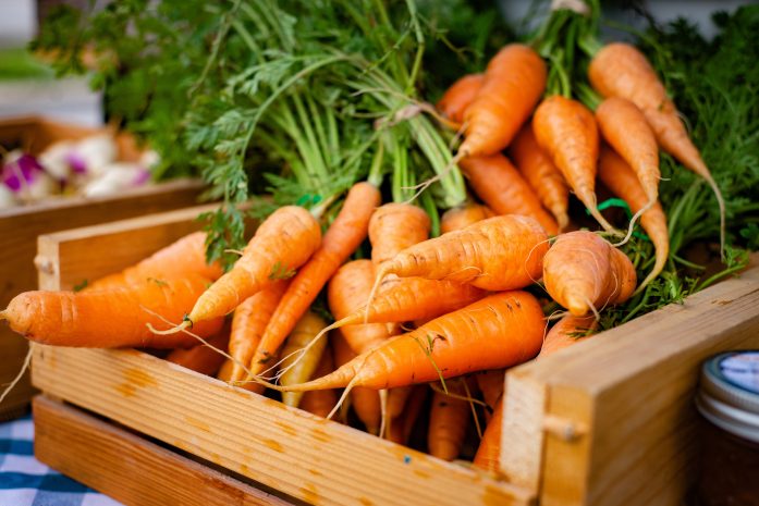 Bundle of carrots in a box